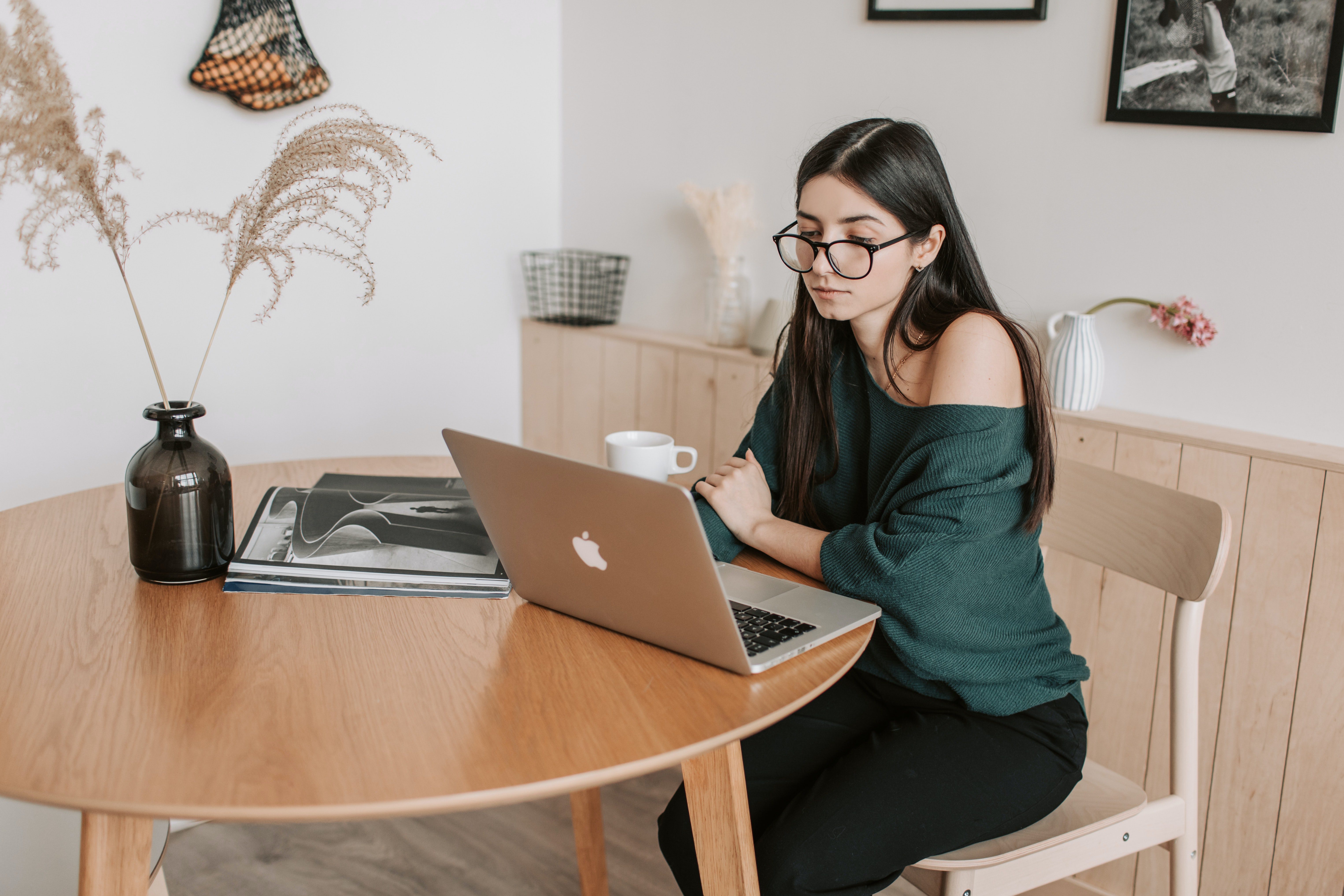 Woman staring at a laptop