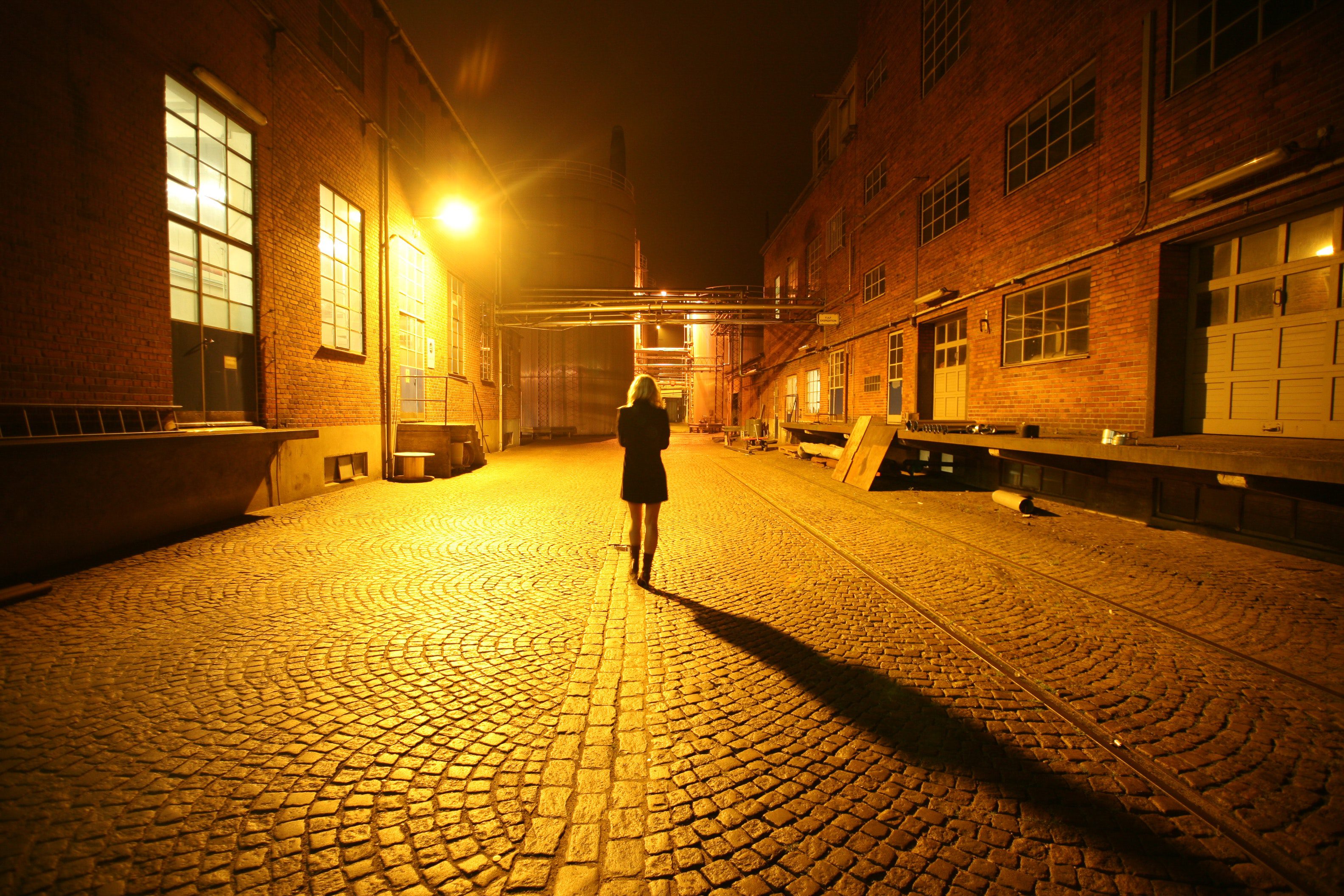 woman walking alone at night